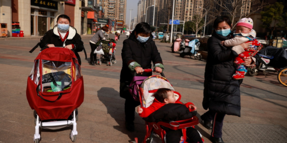 China allows couples to have up to three children
