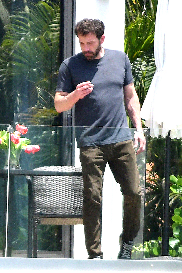 Jennifer Lopez and Ben Affleck hang out on the balcony of their Miami home