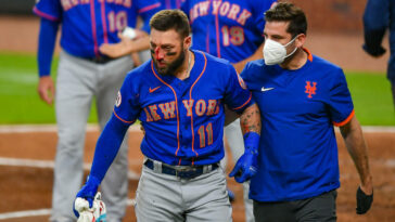 MLB player Kevin Pillar is hit in the face by a 94 MPH fastball