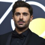 Zac Efron shows off his face in a new photo promoting his Netflix series