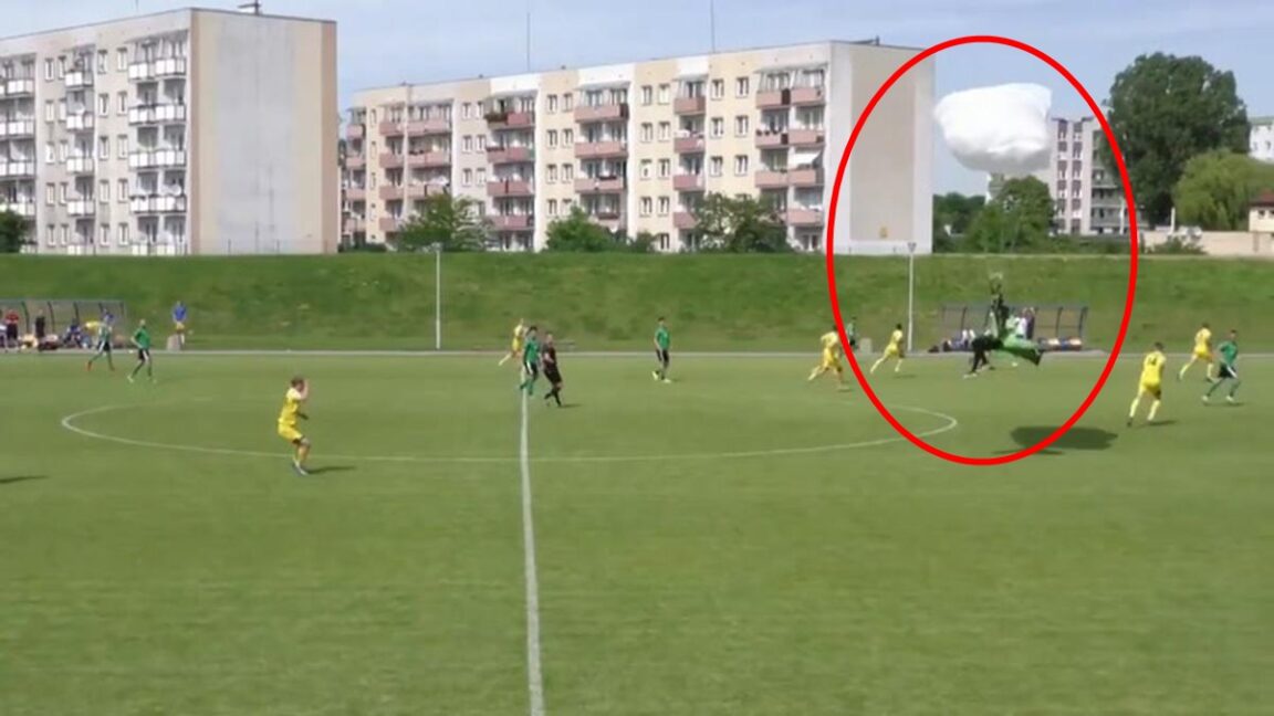 Parachutist fell in the middle of a soccer match in Poland and the referee reprimanded him