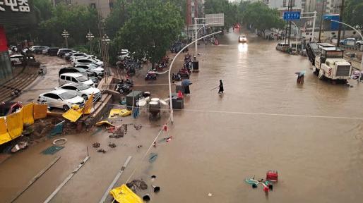 At least 12 dead in China's worst floods in 1,000 years