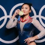 Suni Lee wins gold for the United States after Simone Biles withdrew from the competition