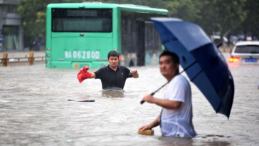 At least 12 dead in China's worst floods in 1,000 years