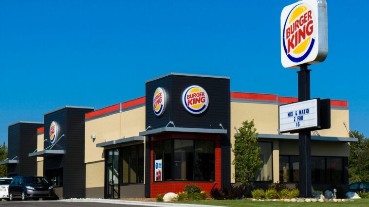 Burger King workers write 'we all quit' on a sign