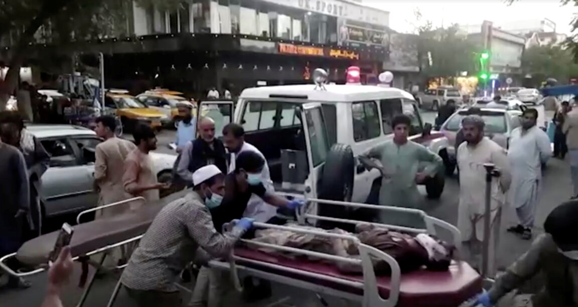 Dozens killed and injured in two blasts at Kabul airport