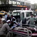Dozens killed and injured in two blasts at Kabul airport