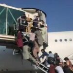 Desperate Afghans try to board flights to escape Taliban