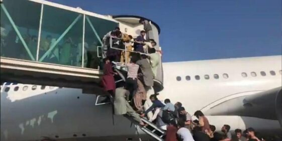 Desperate Afghans try to board flights to escape Taliban