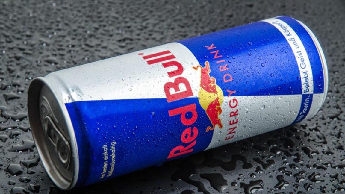 A teenager who drinks 12 cans of Red Bull a day was admitted to hospital after suffering heart cramps