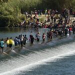 Thousands of Haitian migrants camp out under a bridge in Texas