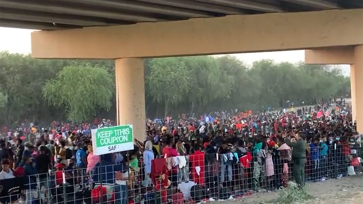 Thousands of Haitian migrants camp out under a bridge in Texas