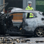 Trapped man shouted to his friends to get him out of the car before it exploded and killed three people