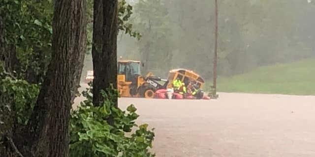 Students rescued from school bus that was submerged due to flooding