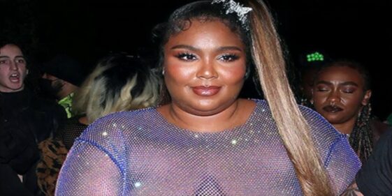 Lizzo looks amazing in a sheer mesh dress as she makes her way to Cardi B's birthday party