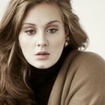 Singer Adele tearfully announces postponement of her Las Vegas concert series