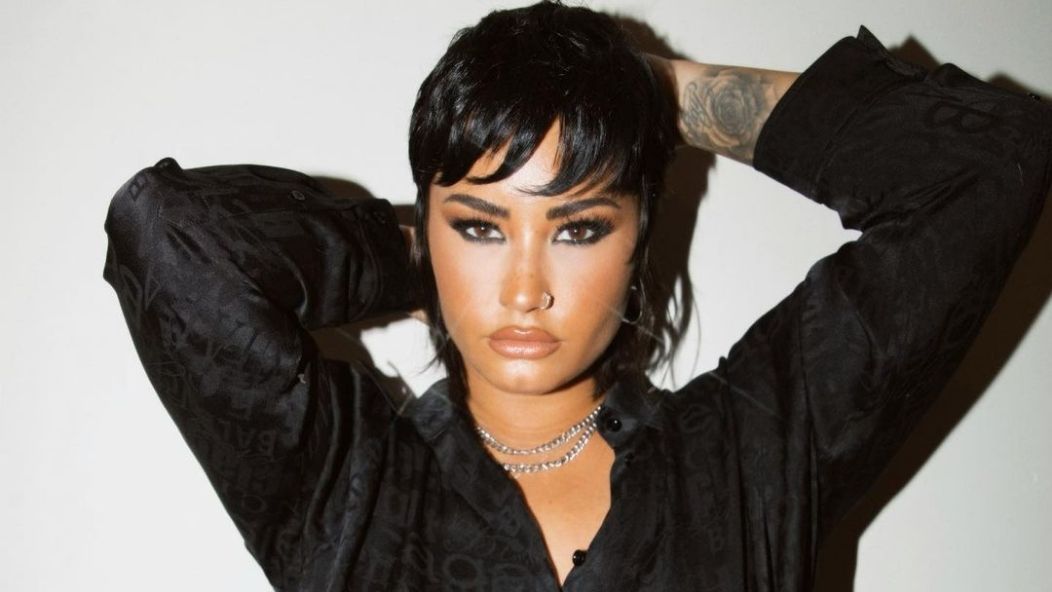 Demi Lovato says they can't always identify as non-binary as they continue their gender journey