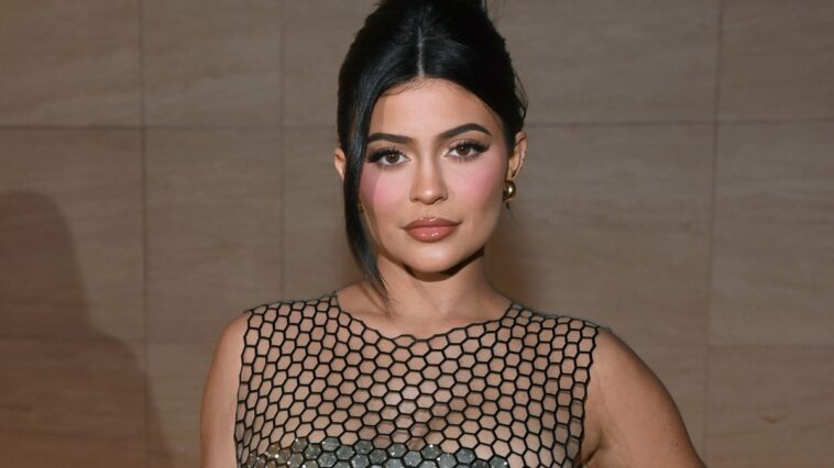 Kylie Jenner, the girlfriend of rapper Travis Scott, is "broken and devastated" amid Friday night's deadly disaster at Astroworld Festival.