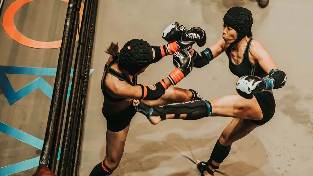 A female MMA fighter is beaten into submission by a male opponent in a mixed-gender bout screened in Poland
