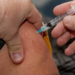 A man receives ten injections of Covid-19 vaccine in one day using different names