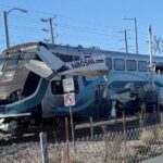 A small plane crashed onto the train tracks and was then run over by the train