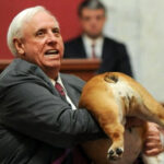 West Virginia Gov. Jim Justice invites opponents to kiss his dog's butt