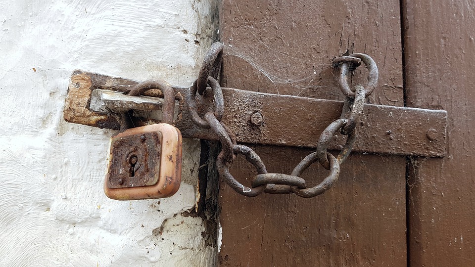 Parents are arrested for keeping their adopted son locked in a garage for five years